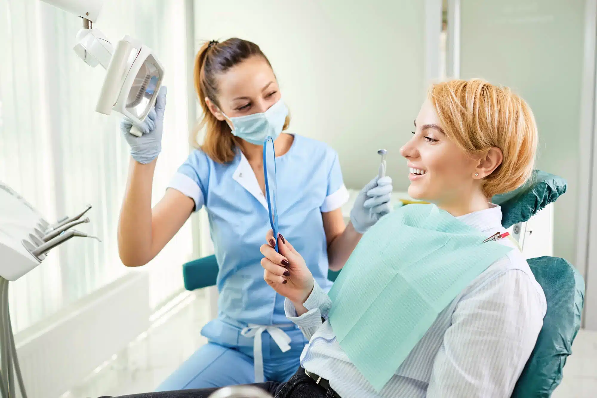 Doctor and Pation happy in the dentist in riverview mi