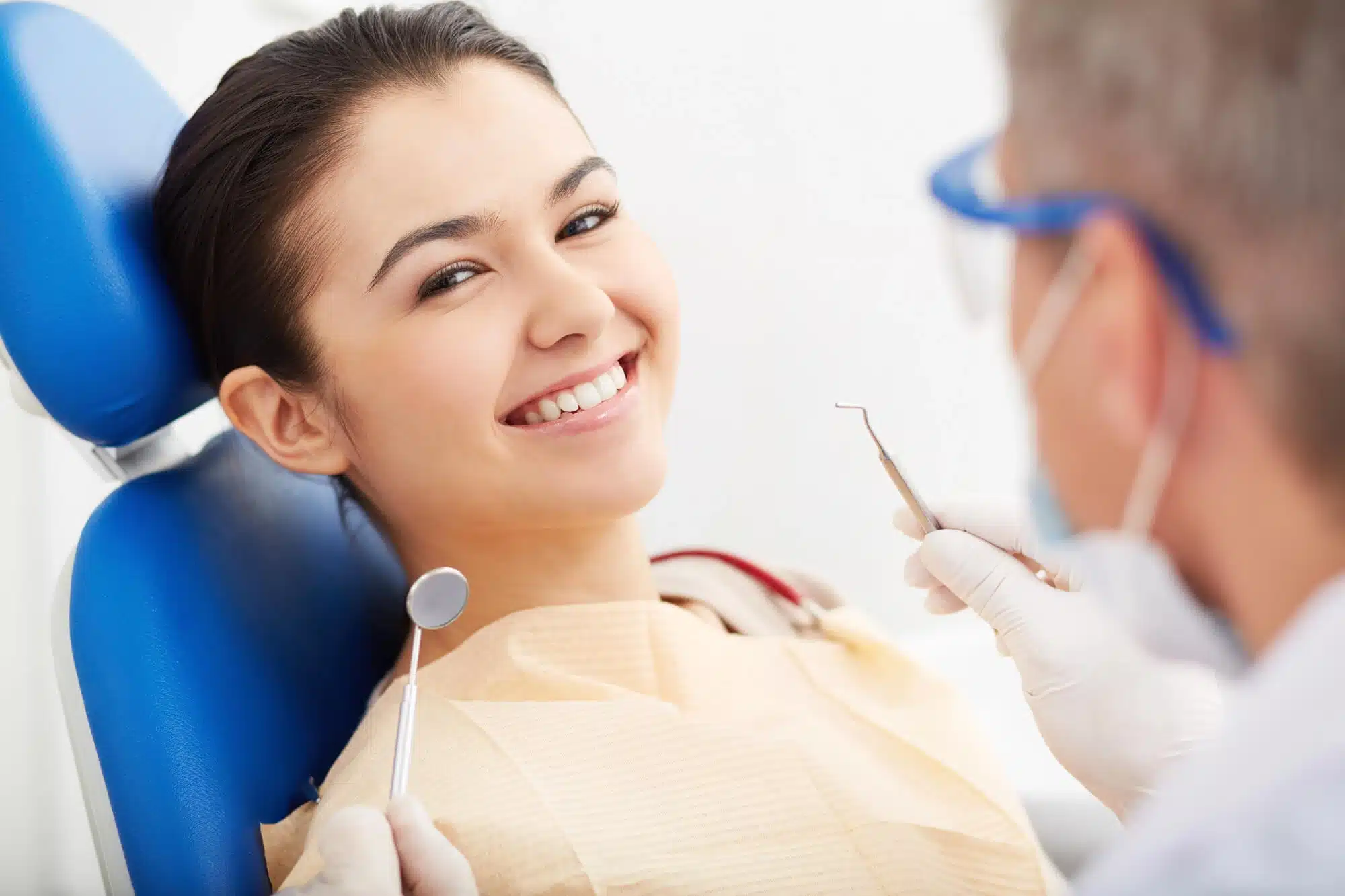 Happy Patient After Dental Crowns Riverview MI Treatment